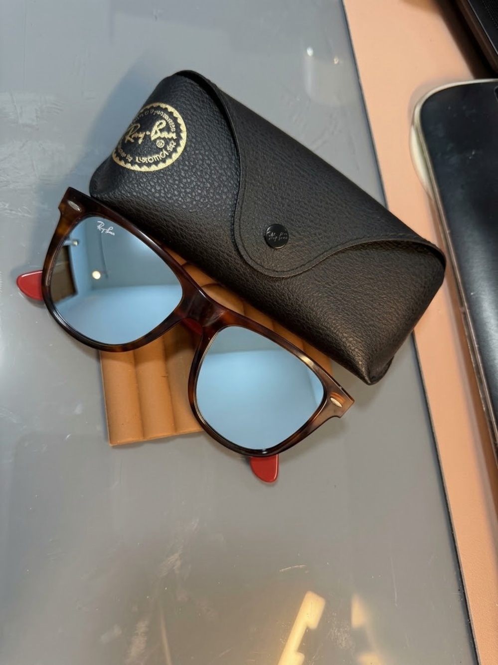 Ray-Ban Tortoiseshell Frame Sunglasses with Light Blue Lenses